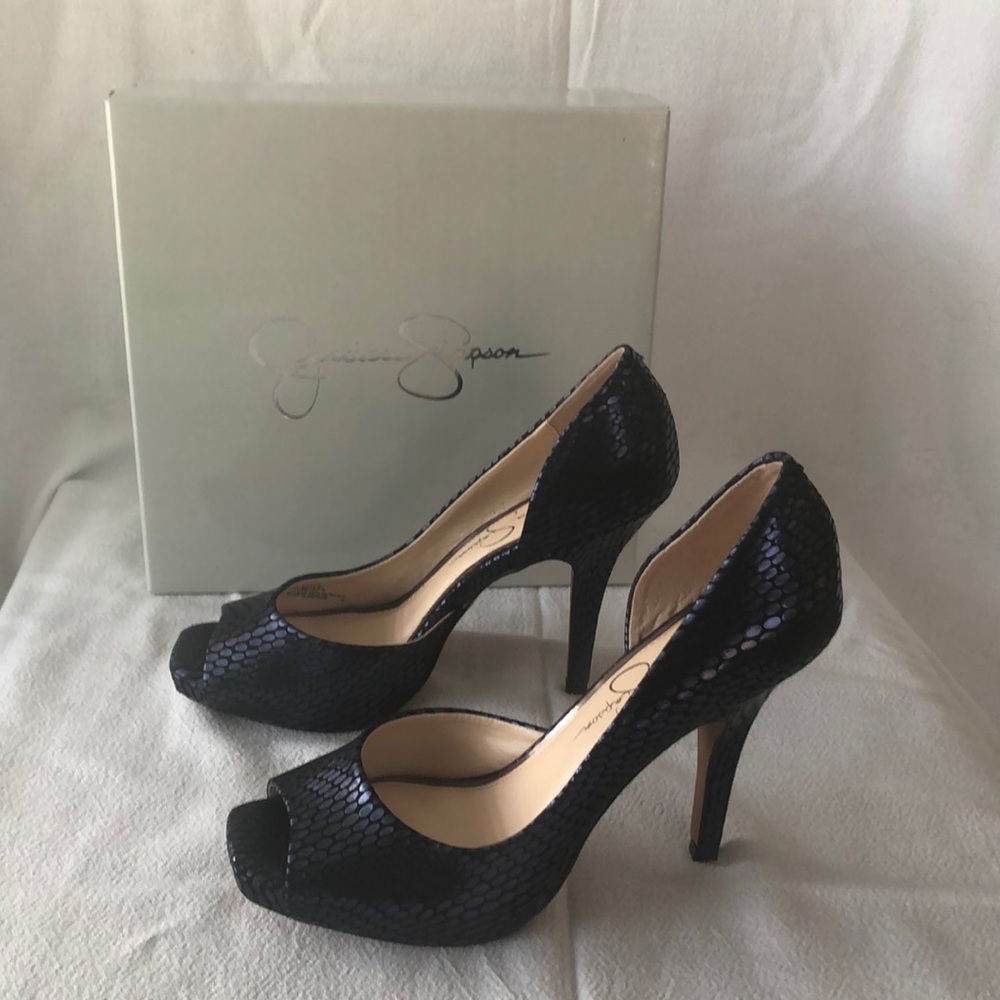 These are a beautiful metallic dark blue. I barely worn them.